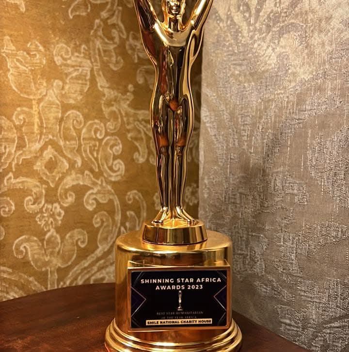Smiley's National Charity House receiving Best Humanitarian Award, Shining Star Awards 2023