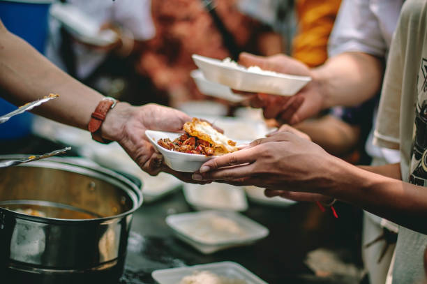 Volunteers serving daily meals at the soup kitchen